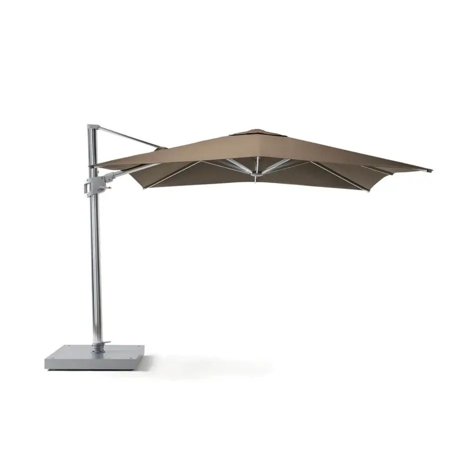Elegant Ethimo Freedom umbrella crafted in neutral beige with a satin metal frame offering adjustable coverage