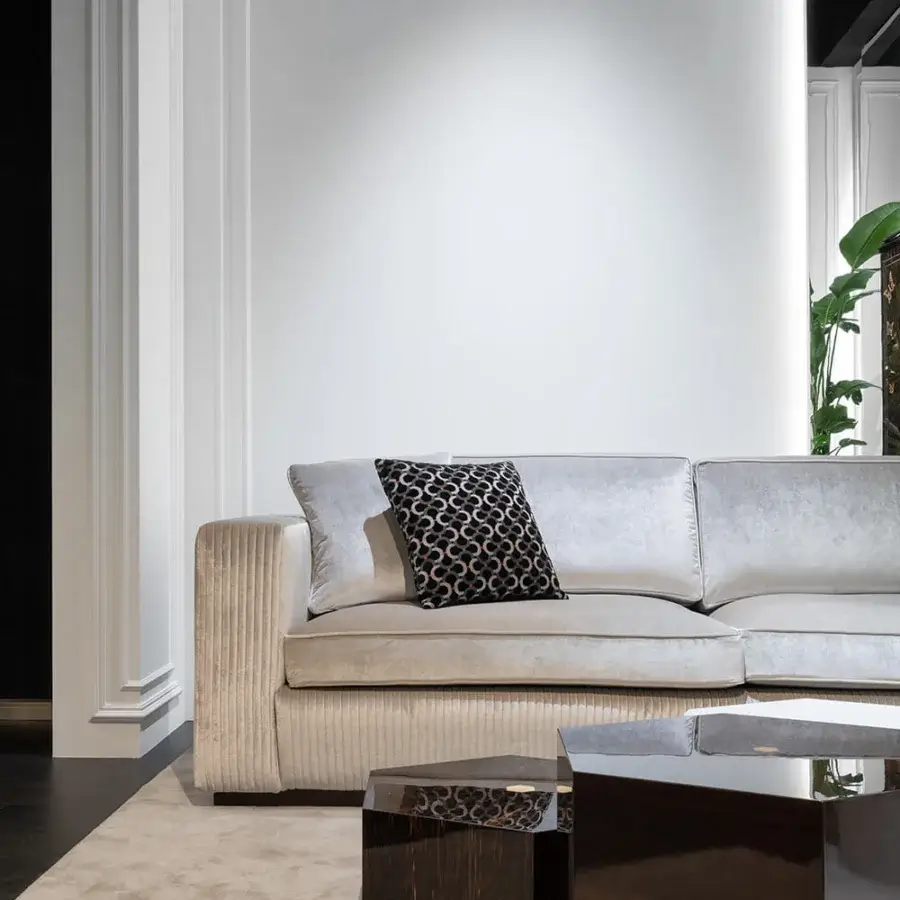 Distinctive Zanaboni Brera sofa crafted in light beige textile with embroidered vertical bands and semi-gloss ebony wood base