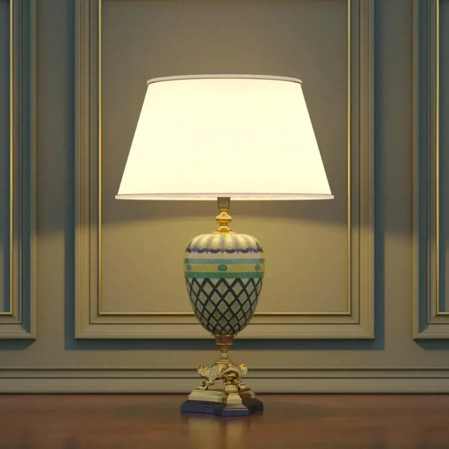 Traditional Laudarte Hottonia table lamp with a creamy white urn body and 24K gold plated bronze castings crafted in stone and mother of pearl