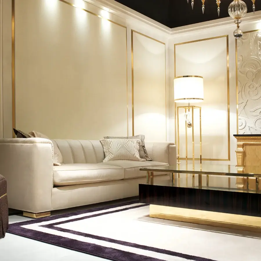 Lavish Zanaboni Magritte sofa with channeled backrest and light beige velvet padding, finished with gold-tone metal feet