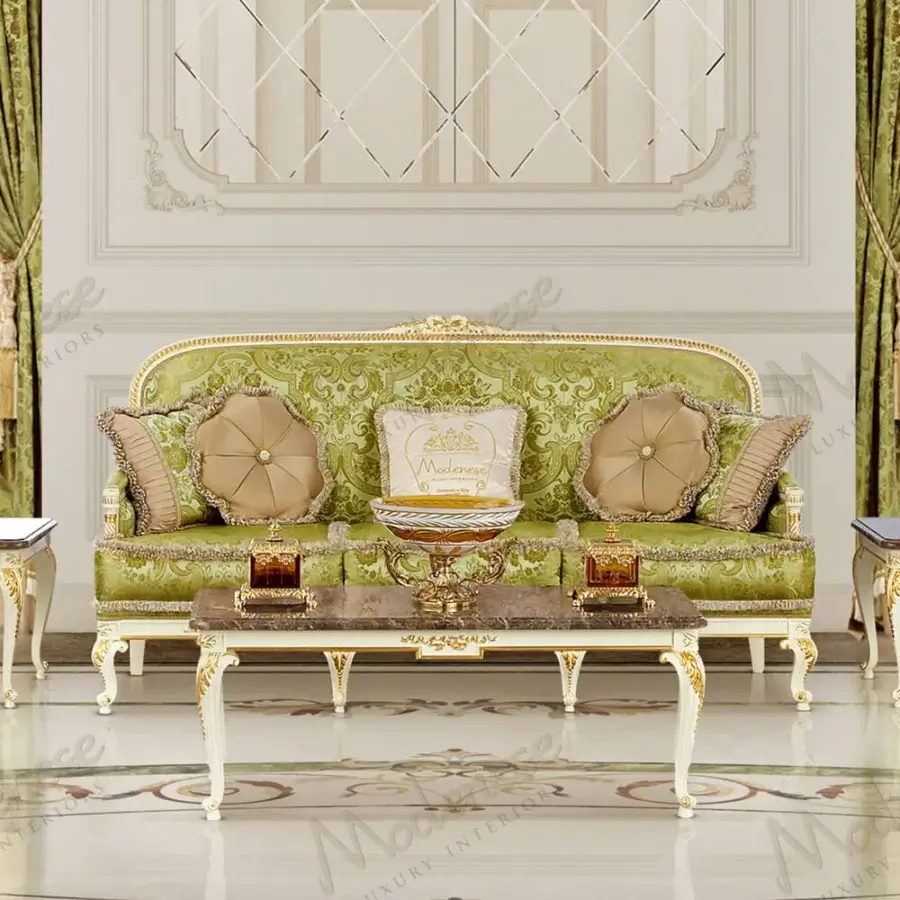 Distinguished Modenese Midnight Moon sofa with light green fabric upholstery, hand-carved wood and glossy gold leaf accents