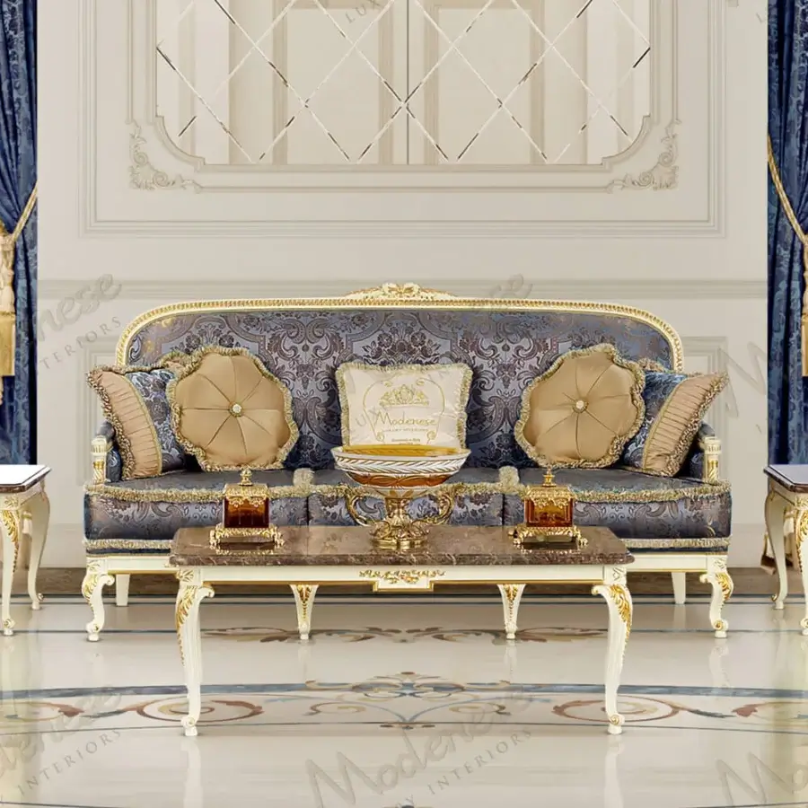 Lavish Modenese Midnight Moon sofa upholstered in deep navy fabric with gold leaf and hand-carved wood frame with glossy sheen