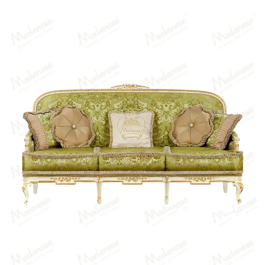 Lavish Modenese Midnight Moon sofa upholstered in sumptuous muted green fabric with gold leaf finish