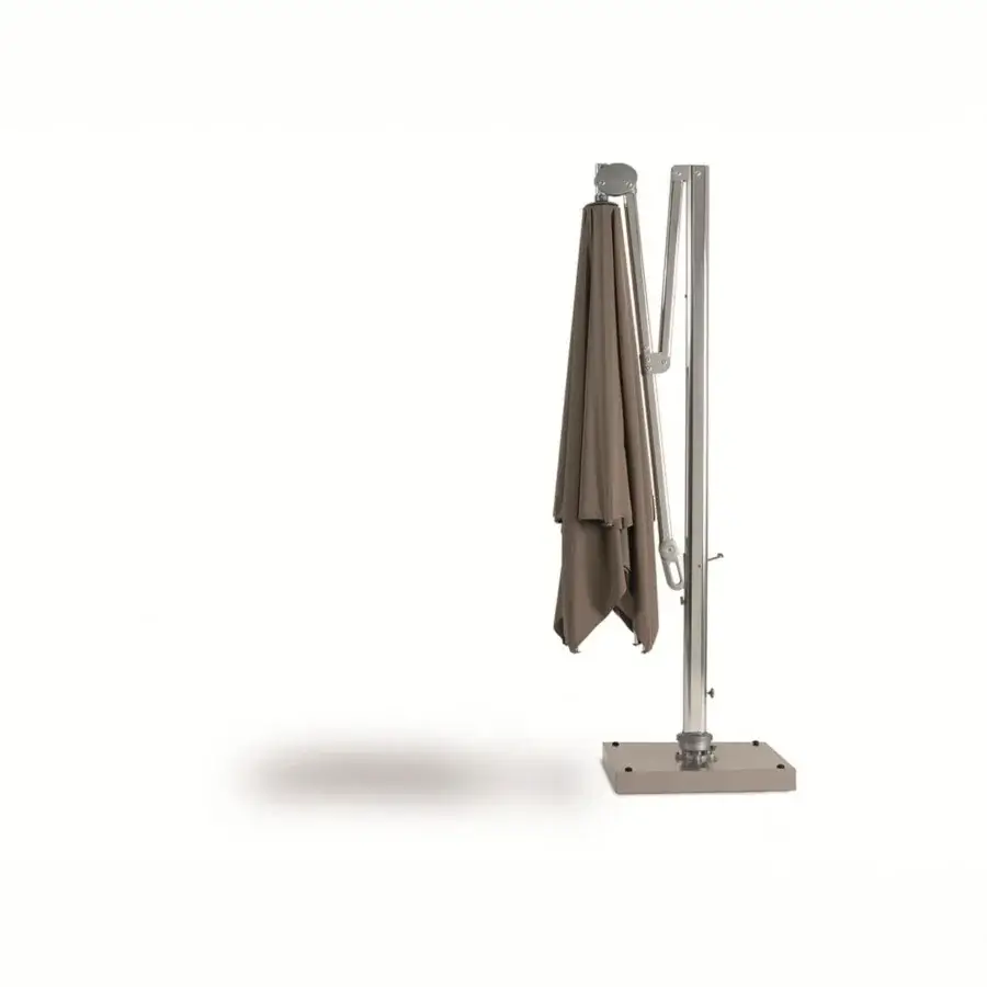 Distinguished Ethimo Freedom umbrella with a satin-finish metal frame and muted brown textile canopy offering full swivel functionality