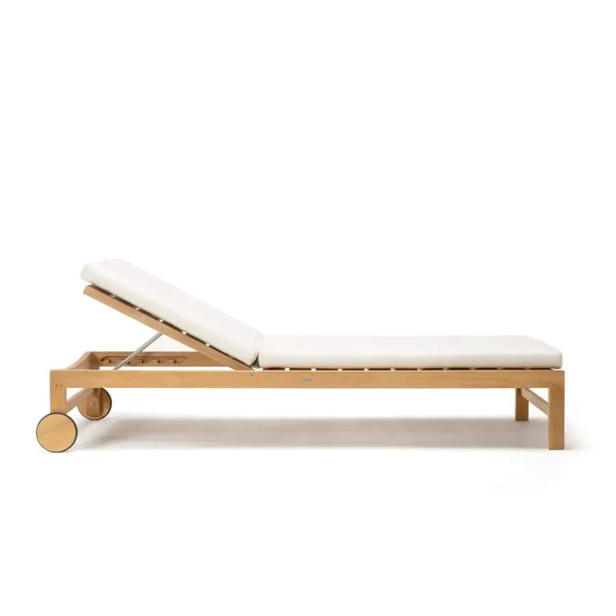 Superior Ethimo Sand lounger crafted in Italy with a satin light brown wood frame and plush off-white cushions
