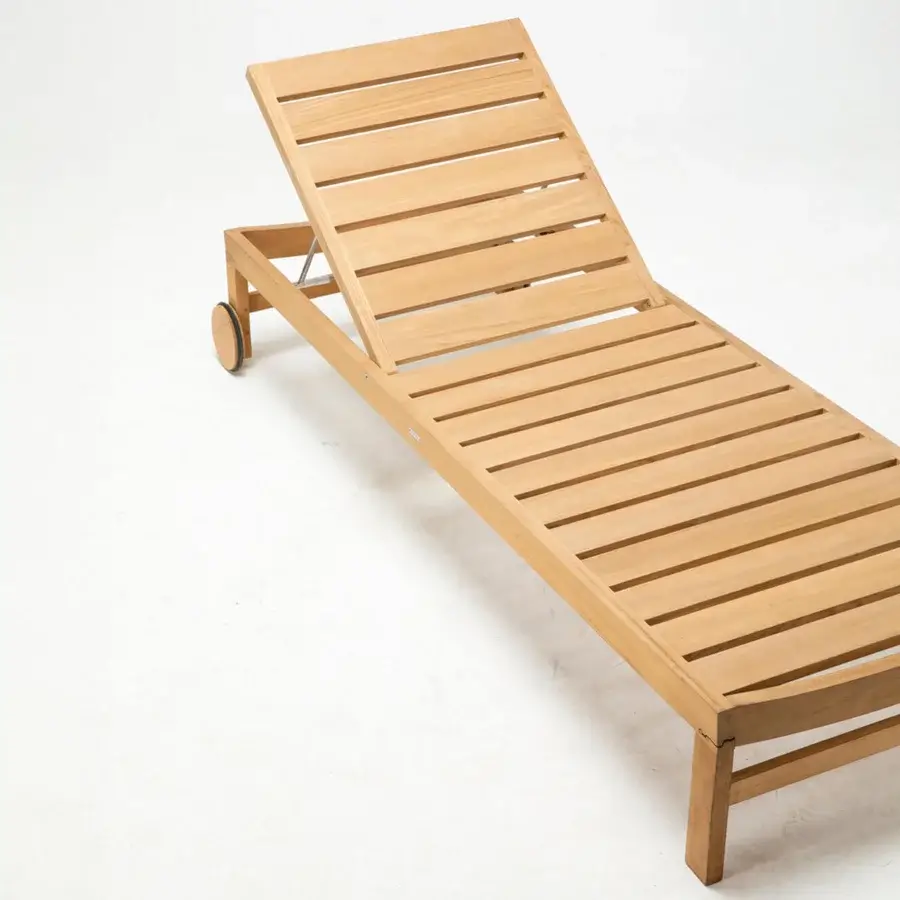 Captivating Ethimo Sand lounger crafted in warm medium-toned wood with an angular silhouette and smooth satin finish