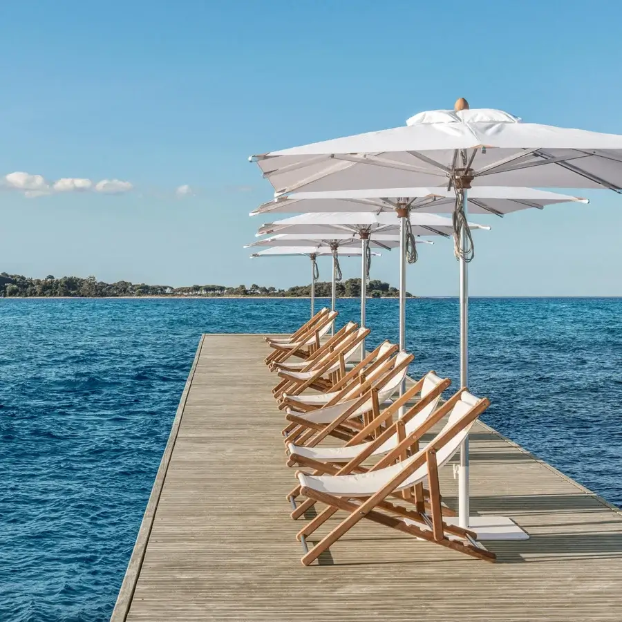 Exceptional Ethimo Free Umbrella parasol in matte white textile with smooth light-colored metal construction