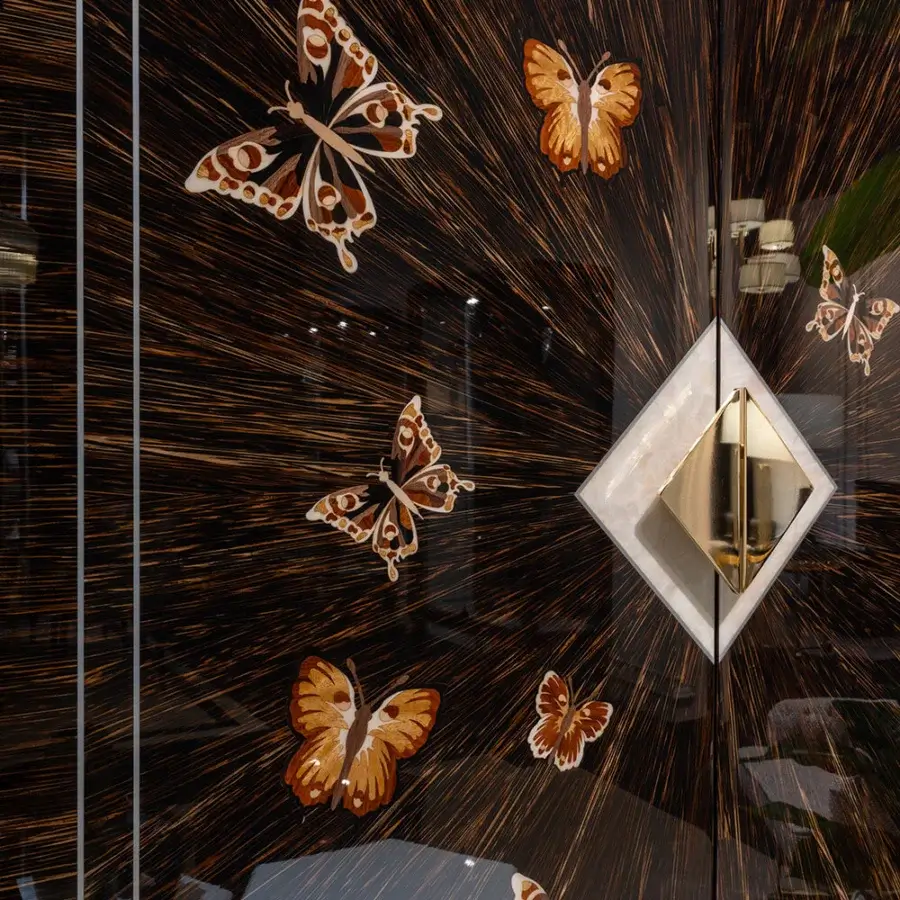 Superior Zanaboni W064 cupboard built with palm wood, precious wood inlay and gold butterfly motifs with a glossy dark brown finish