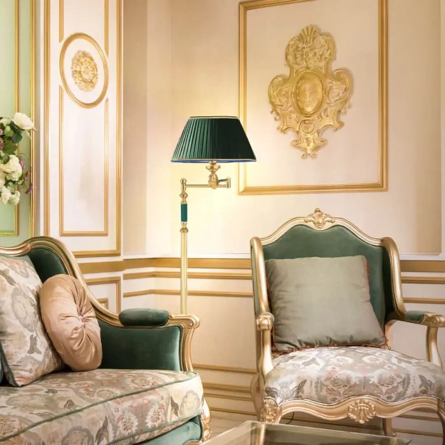 Distinguished Laudarte Angelo floor lamp crafted in bronze with 24K ancient gold plating and a deep green textile lampshade