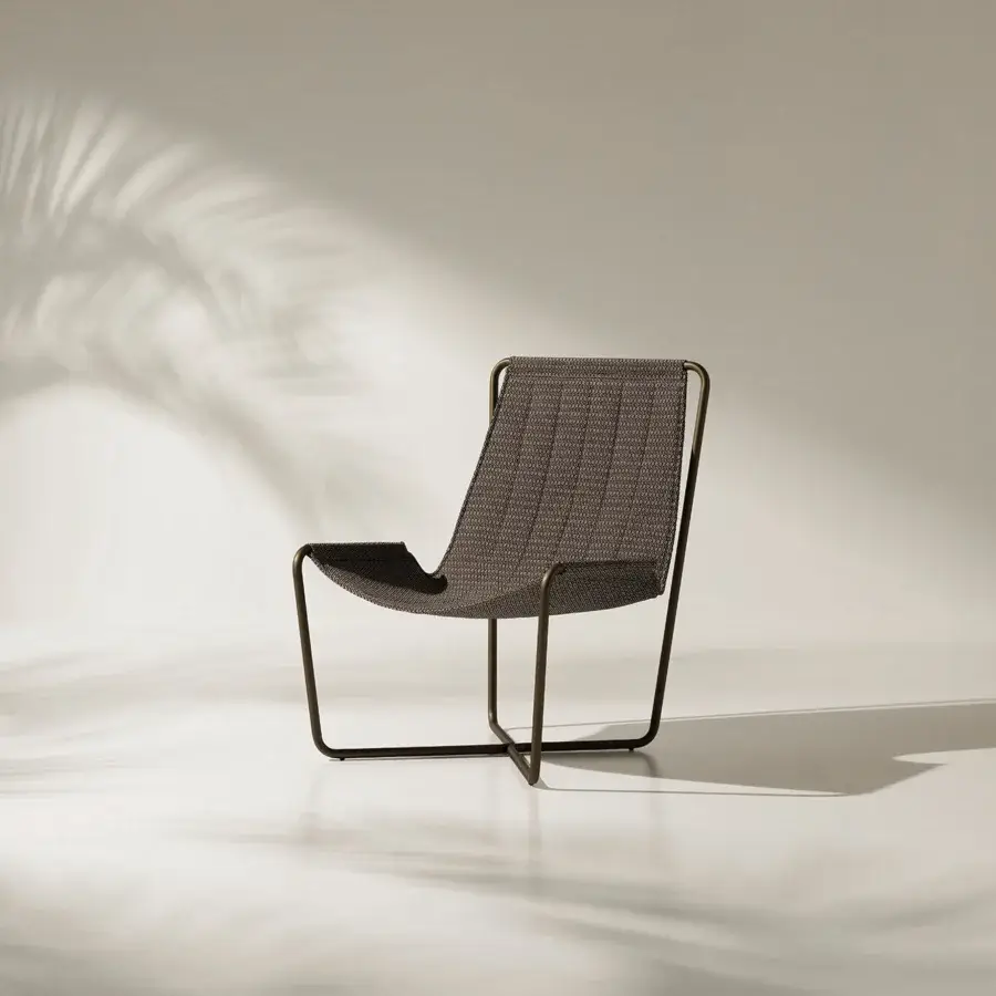 Elegant Ethimo Sling lounge chair with a matte metal frame and dark muted gray woven textile construction