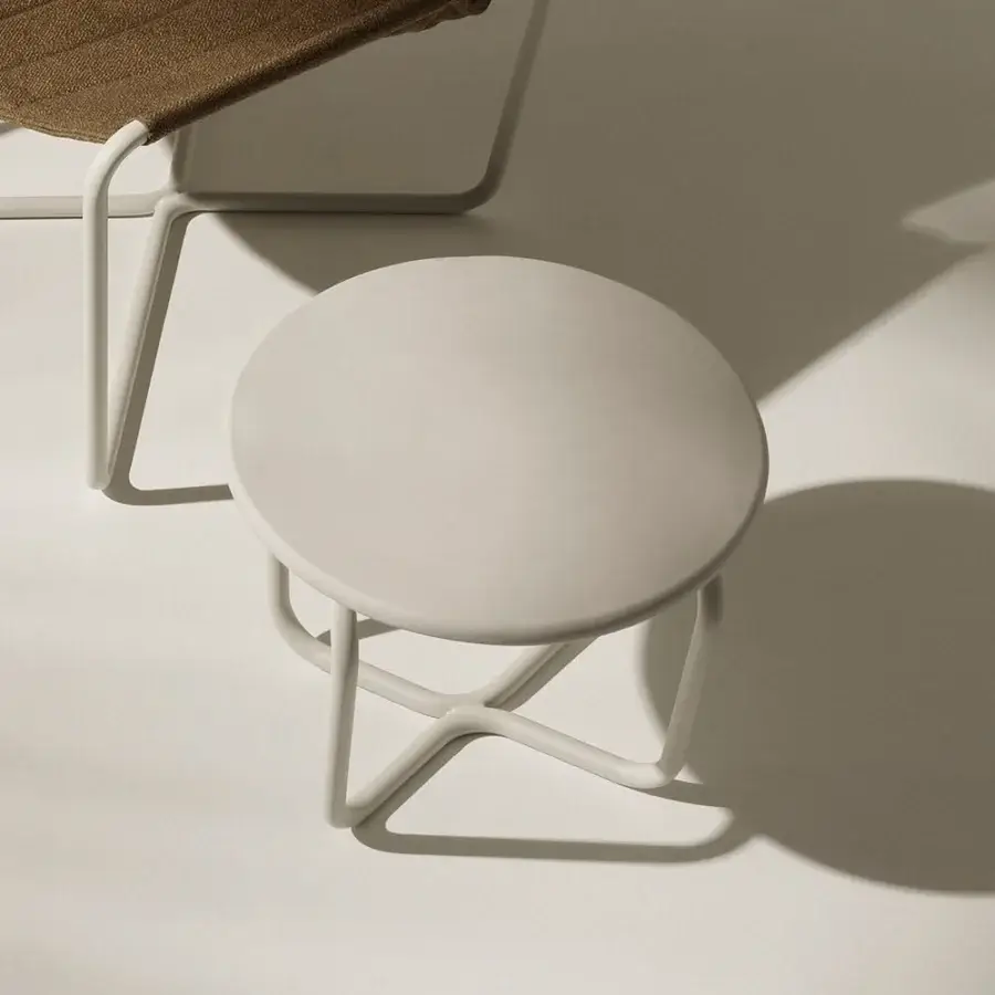 Superior Ethimo Sling Side Table crafted in Italy with a sleek circular form and matte neutral beige coloration