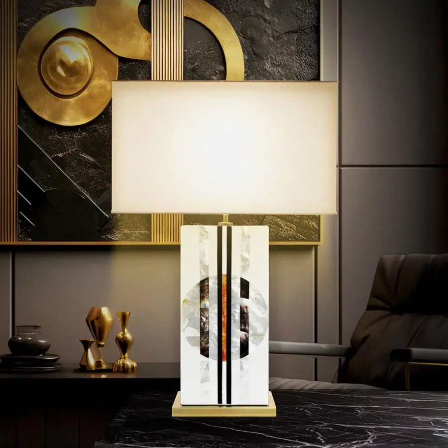 Lavish Laudarte Rock Table Lamp crafted in brass with a hand-assembled mosaic of stone and mother of pearl with a polished gold-toned base
