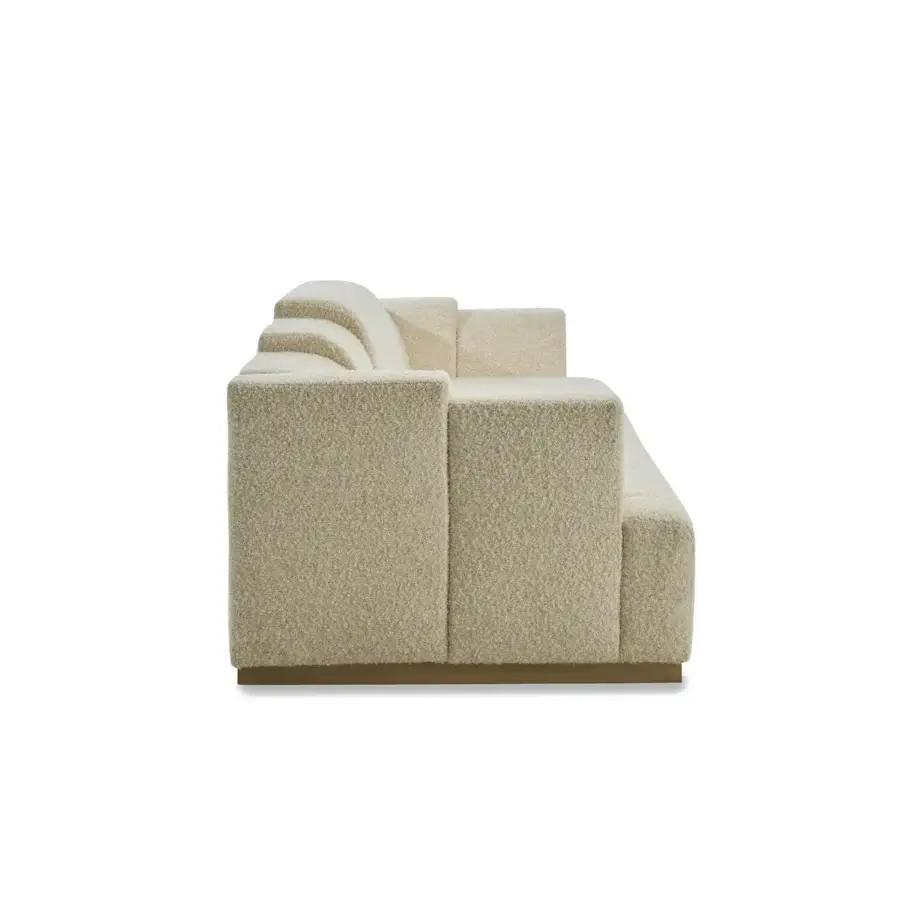 Architectural Zanaboni Nouvelle Vague sofa with soft textured bouclé textile and Canaletto walnut-stained wooden base