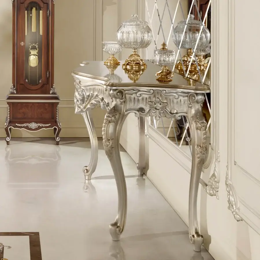 Distinguished Modenese Luxury Furniture Noble Etiquette console in silver leaf with floral motifs and curved cabriole legs