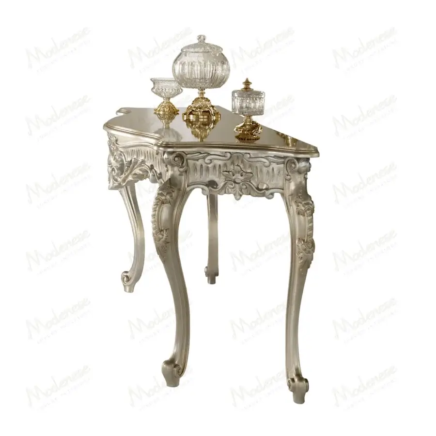 Superior Modenese Noble Etiquette console crafted in Italy with hand-carved details and full silver leaf finish