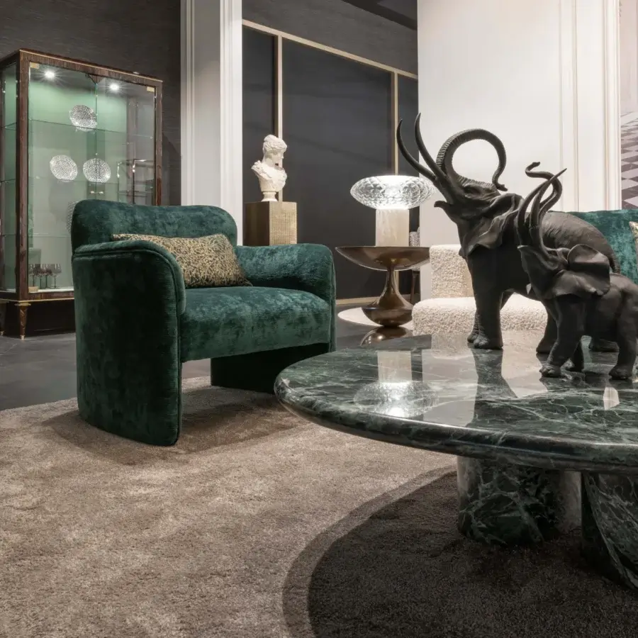 Superior Zanaboni Erica lounge chair in deep green velvet with subtle ribbed texture and rounded silhouette
