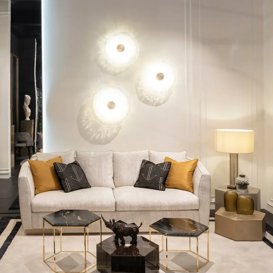 Superior Zanaboni Morgana sofa with tactile light beige fabric upholstery and satin brass recessed base