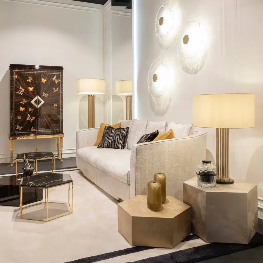 Lavish Zanaboni Morgana sofa with enveloping silhouette in tactile light beige fabric and satin brass finish