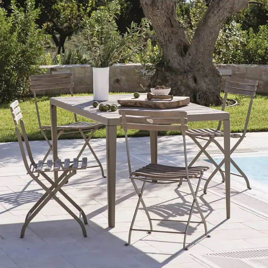 Elegant Ethimo Laren folding chair with a muted grey metal frame and satin finish crafted for indoor or outdoor use
