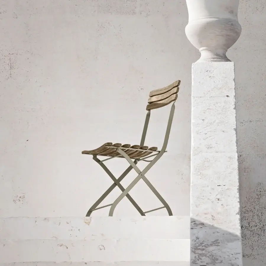 Superior Ethimo Laren folding chair crafted in Italy with warm brown wood slats and pale grey-green matte metal