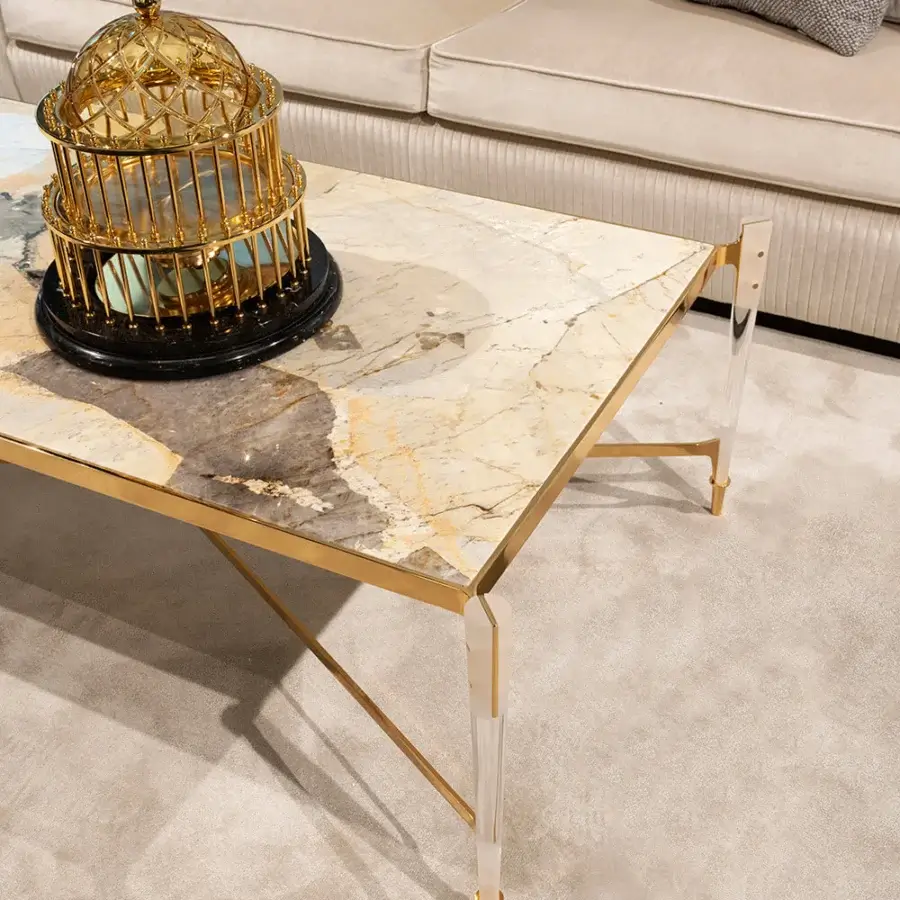 Distinguished Zanaboni T223/R coffee table with Patagonia marble, translucent plexiglass legs and hand-polished brass accents in a glossy finish
