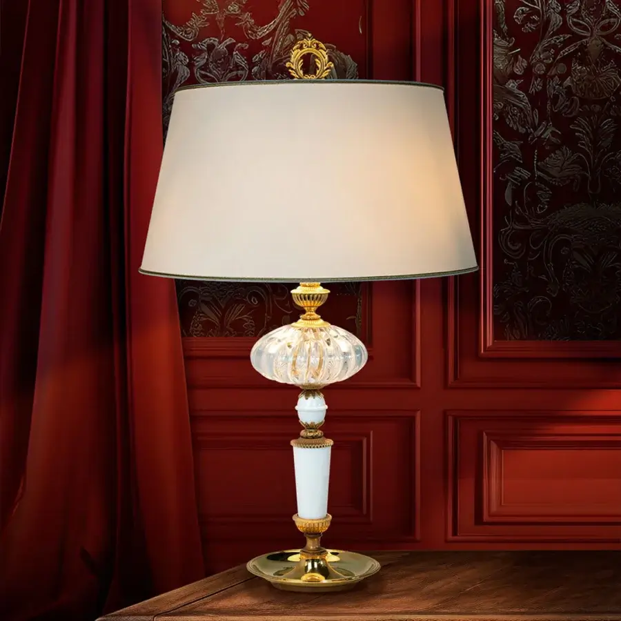 Distinguished Laudarte Temi table lamp with bronze cast structure, 24K ancient gold plating and ribbed Murano glass sphere