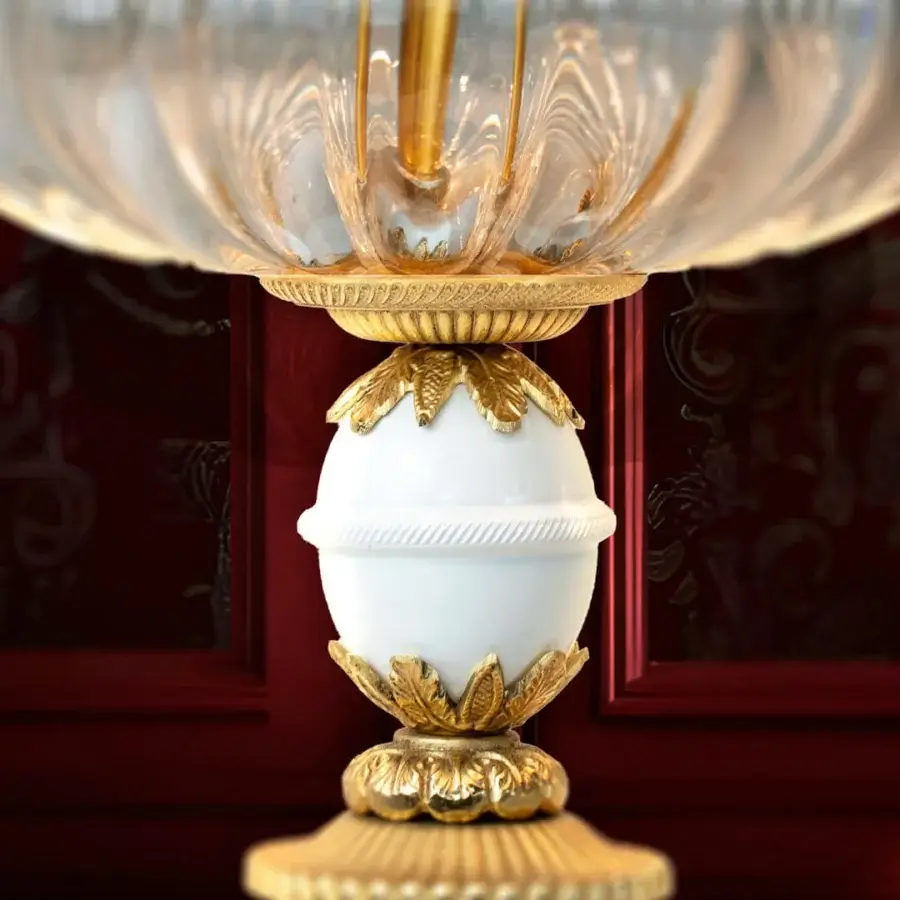Exquisite Laudarte Temi table lamp crafted with bronze, 24K ancient gold plating, sculpted marble and ribbed Murano glass
