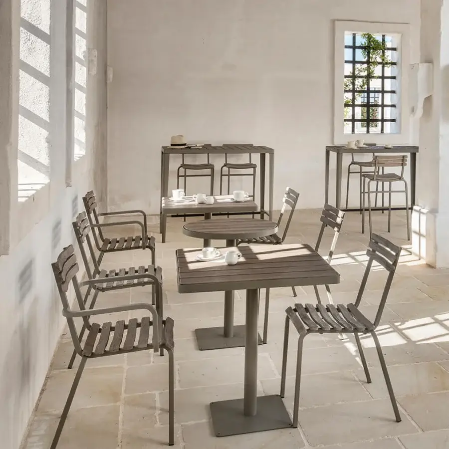 Superior Ethimo Laren chair with sleek angular form and horizontal slat construction in muted gray metal