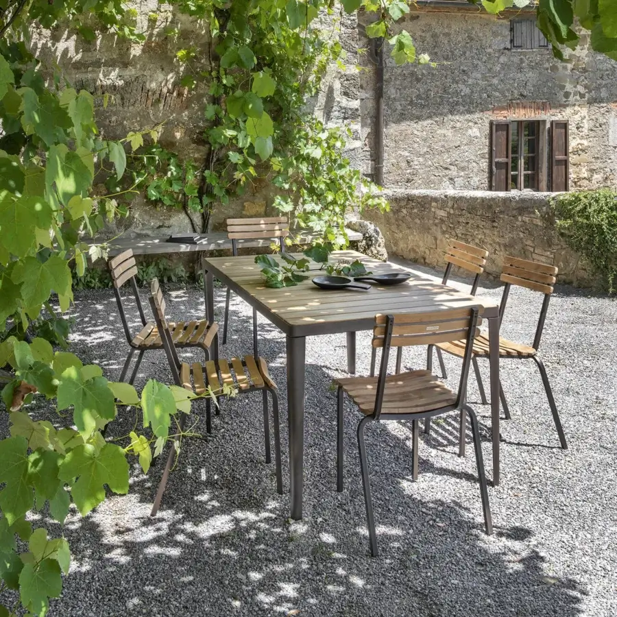 Refined Ethimo Laren chair with warm wood slats and a sleek dark gray metal frame crafted in Italy