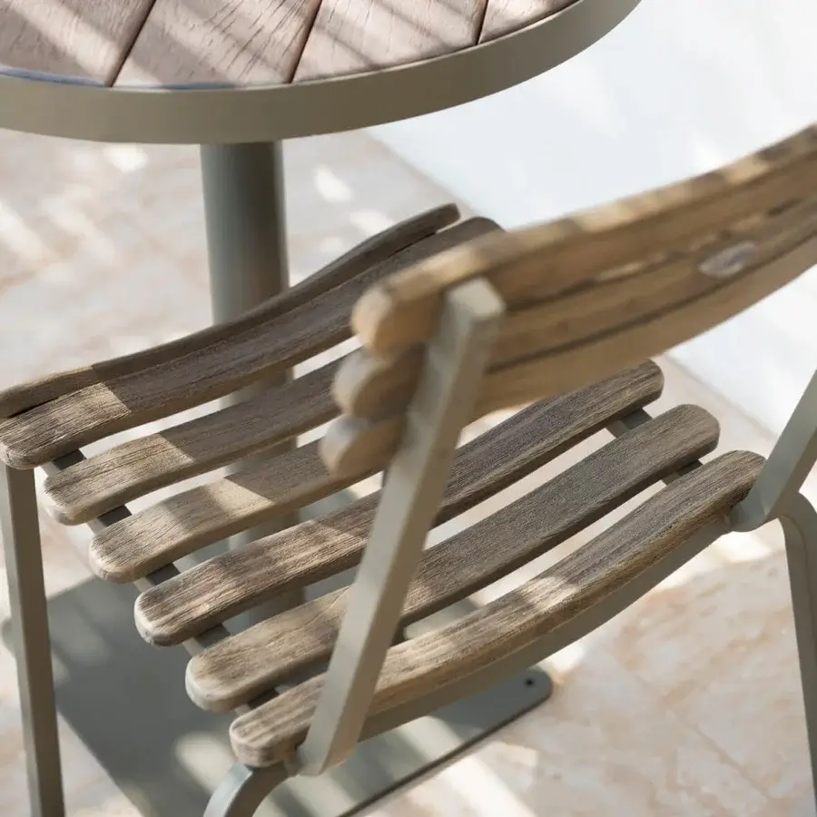Exceptional Ethimo Laren chair with textured wood and matte grey metal, crafted in Italy with gently curved lines