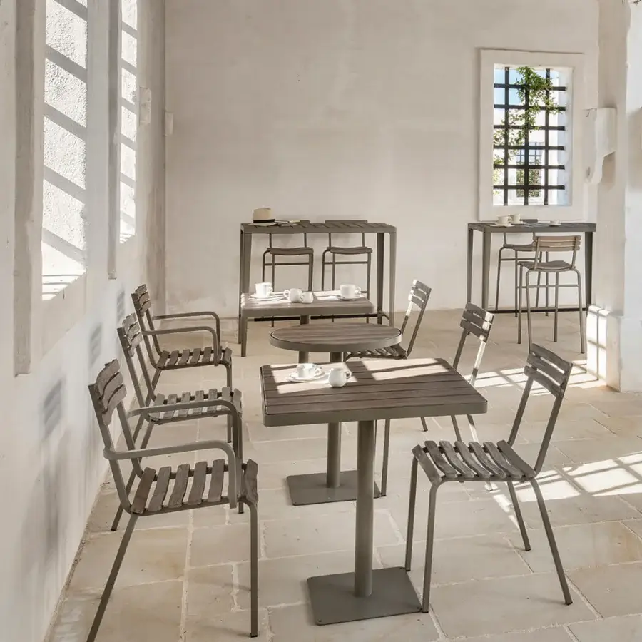 Elegant Ethimo Laren armchair in muted gray with matte metal frame and seat embodies sleek angular form