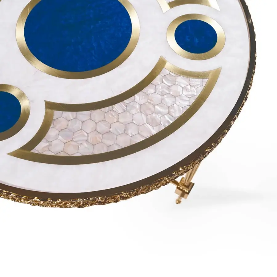 Exquisite Zanaboni T195/S side table crafted with brass and luminous mother-of-pearl inlay in white, blue, and gold tones