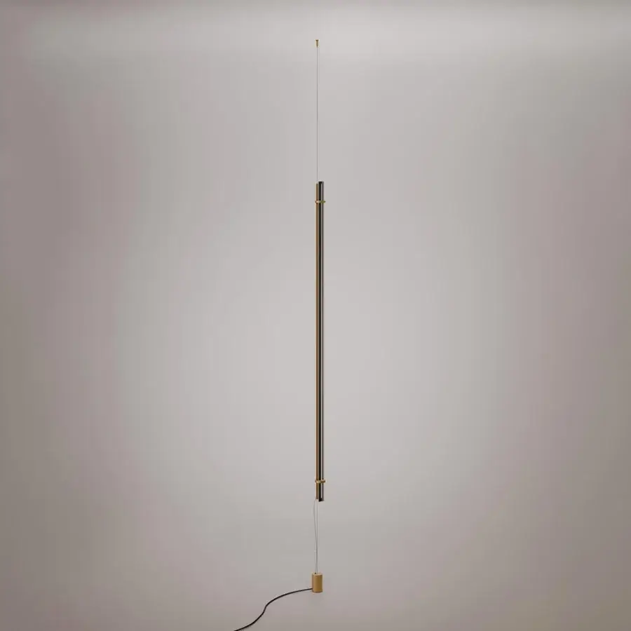 Exceptional VENICEM Optical Floor-Suspension Lamp with a steel cable and dark burnished brass supporting a trihedral amber glass element