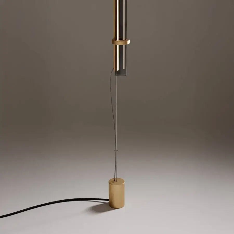 Superior VENICEM Optical Floor-Suspension Lamp with a slender steel cable and trihedral glass diffuser in burnished brass finish