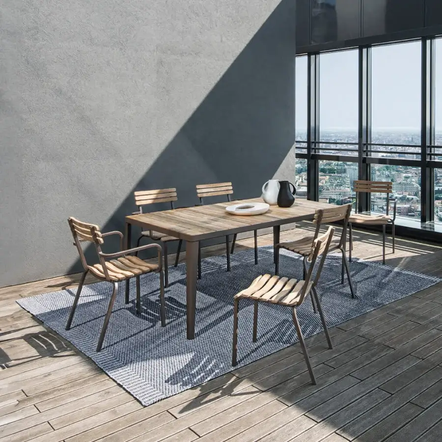 Distinguished Ethimo Laren table crafted in teak with a matte finish embodies contemporary style and balanced proportions