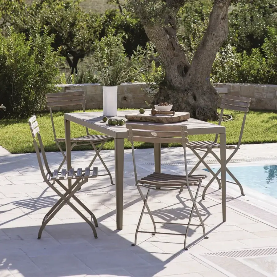 Elegant Ethimo Laren table crafted with teak slats and a discreet metal frame in a muted grey-brown tone with a matte finish