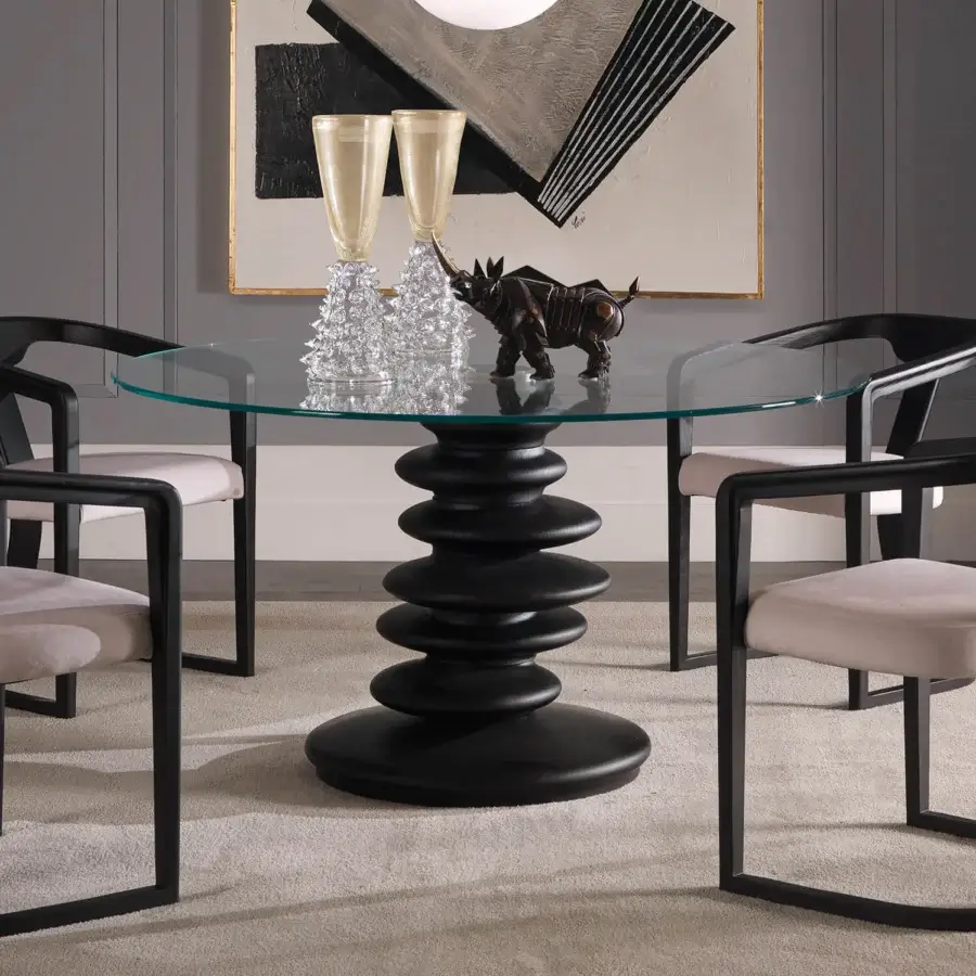 Distinguished Zanaboni Ometto table with a clear glass top and uniquely stacked, stone-inspired dark matte column base