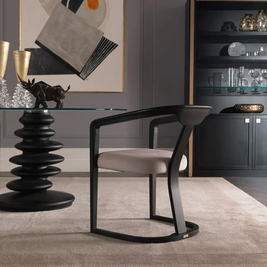 Sophisticated Zanaboni Ometto table with a clear glass top and sculptural base built in overlapping stone-inspired form with a matte finish