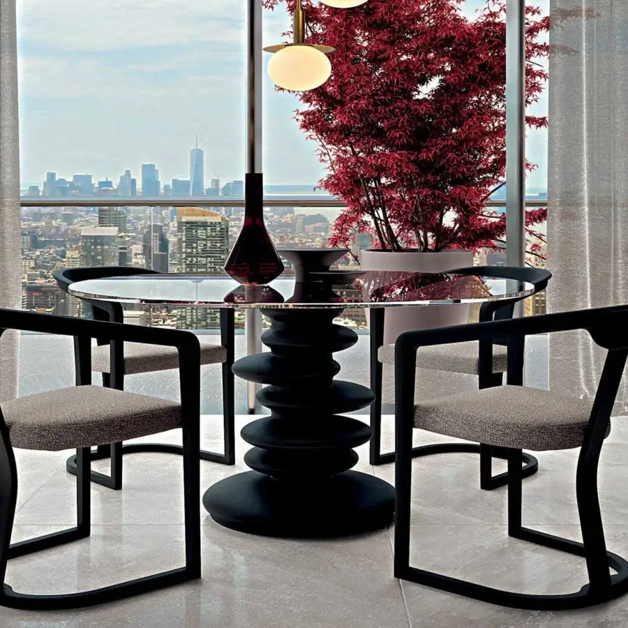 Exceptional Zanaboni Ometto table with a clear glass top and tiered dark-toned wood base in a satin finish