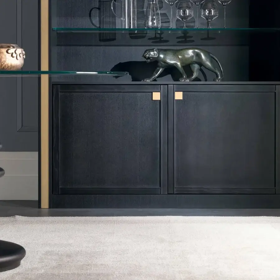 Superior Zanaboni Ometto table with a clear glass top and sculptural dark-toned wood base exhibiting a vertically ribbed pattern