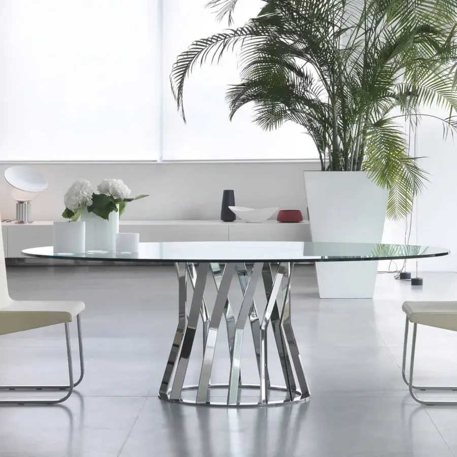 Superior Zanaboni Ray table with oval glass top and bronzed metal base crafted in a radiating arrangement