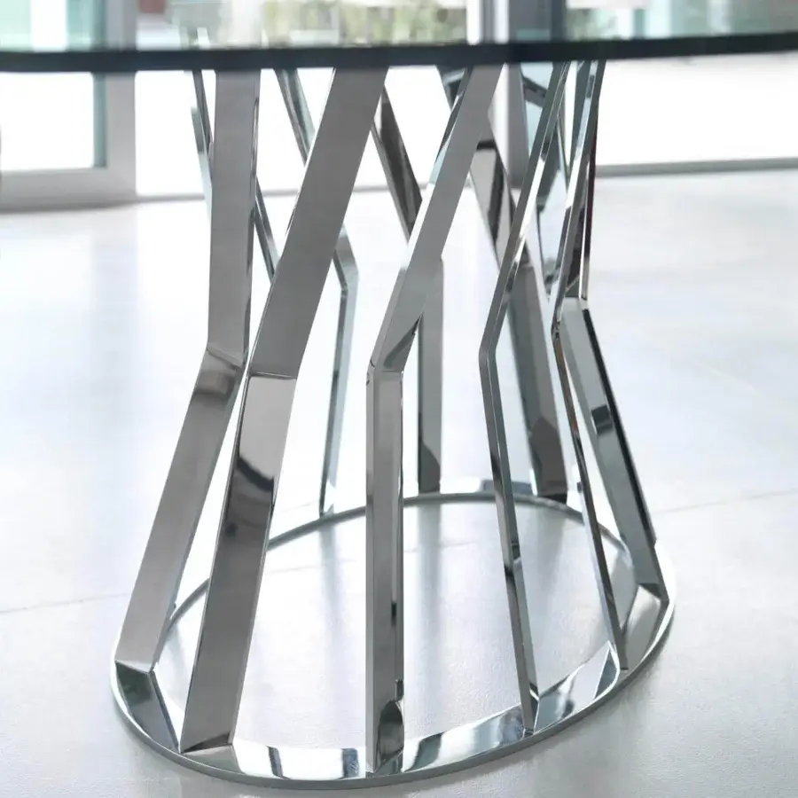 Elegant Zanaboni Ray table with bronzed metal base and marble top embodies lasting style with a contemporary silhouette