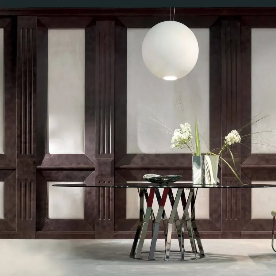 Distinguished Zanaboni Ray table with articulated bronzed metal base and sleek marble tabletop embodies enduring style