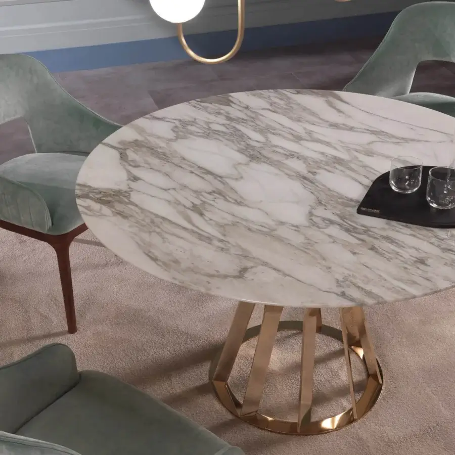 Distinguished Zanaboni Ray round table with white marble top and bronzed articulated metal base crafted in Italy