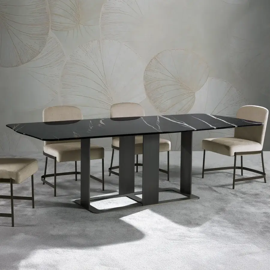 Superior Zanaboni Romance table crafted in black Sahara marble with a bronzed brass base and glossy finish