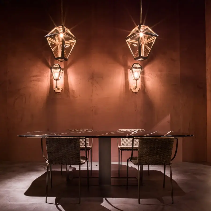 Distinguished Zanaboni Romance table crafted in black Sahara marble with a bronzed brass base and polished finish