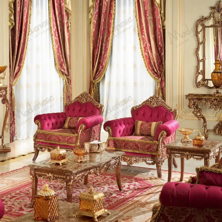 Lavish Modenese Rubino Delight lounge chair upholstered in ruby-red velvet with intricate gold damask and gilded hand-carved wood