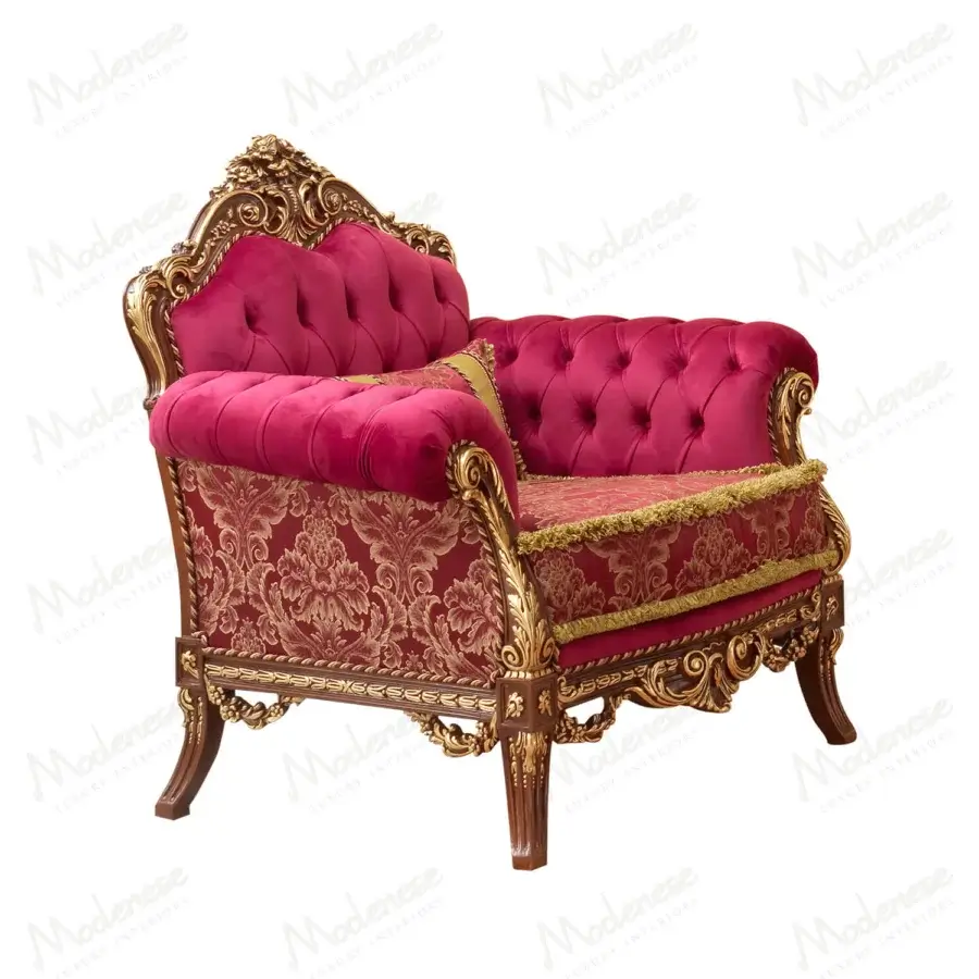 Sumptuous Modenese Rubino Delight lounge chair upholstered in ruby-red velvet with gilded hand-carved wooden frame