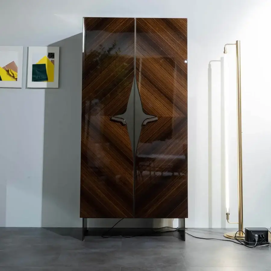 Exceptional Zanaboni Romance cupboard crafted from glossy dark brown eucalyptus wood with bronzed lux metal and curated leather interior