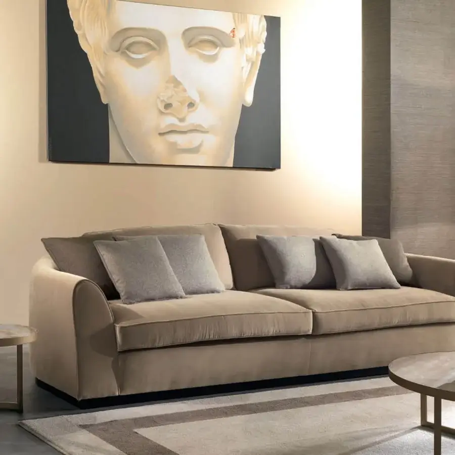 Distinguished Zanaboni Santiago sofa with a mocha-stained wooden base and plush matte woven beige upholstery including a darker gray accent pillow